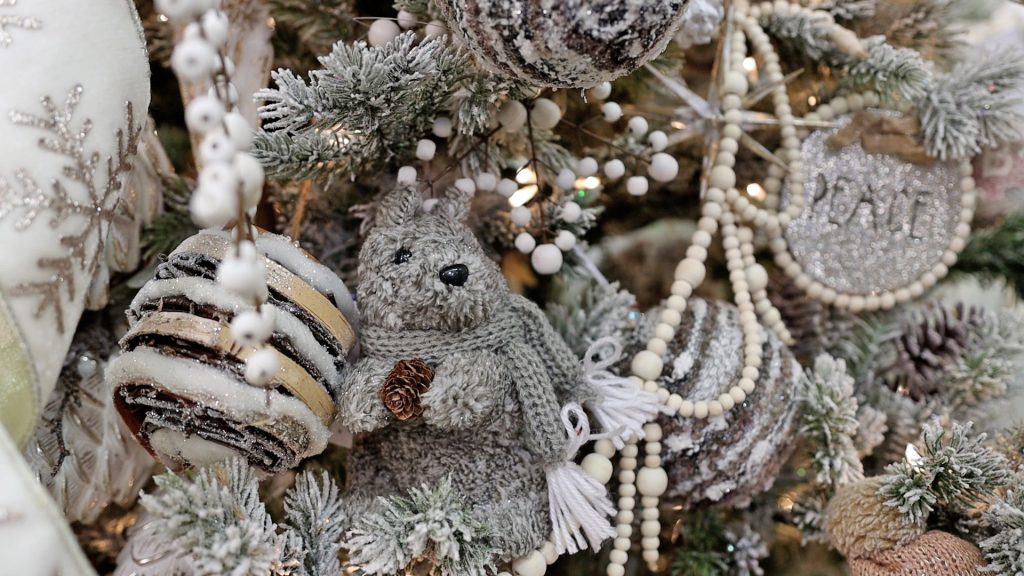 For her French country Christmas tree, Amitha Verma used a stuffed squirrel wearing a scarf rather than it just being on a tabletop.