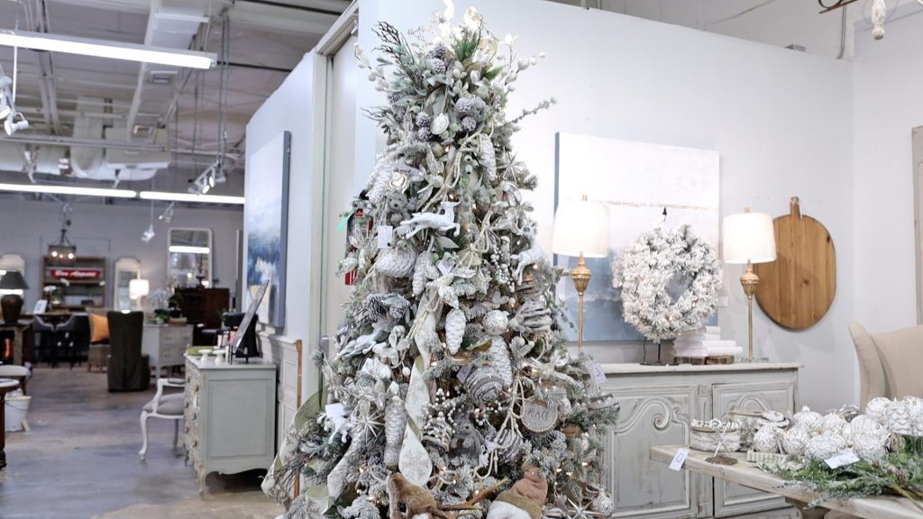 Amitha Verma used three ribbon techniques and holiday decor to design a whitewashed farmhouse Christmas tree at Village Antiques.