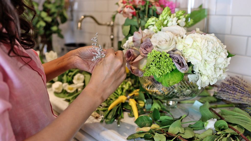 Amitha Verma uses low bowls to create floral arrangements centerpiece on a spring breakfast table.