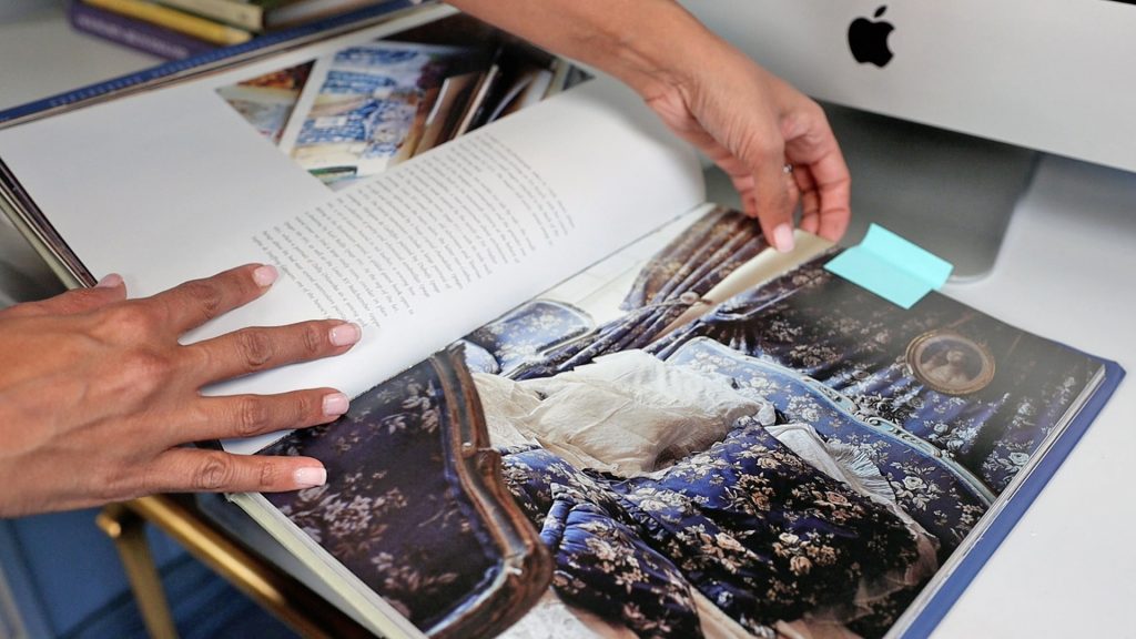 Amitha Verma uses books to pull from different architecture and designs vision boards like an interior designer. 
