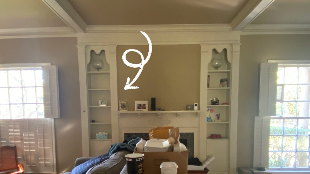 The elliptical arch that Amitha Verma planned to add to her brother’s cottage style makeover will not interfere with the fireplace, but it would eliminate a bookshelf on one side.