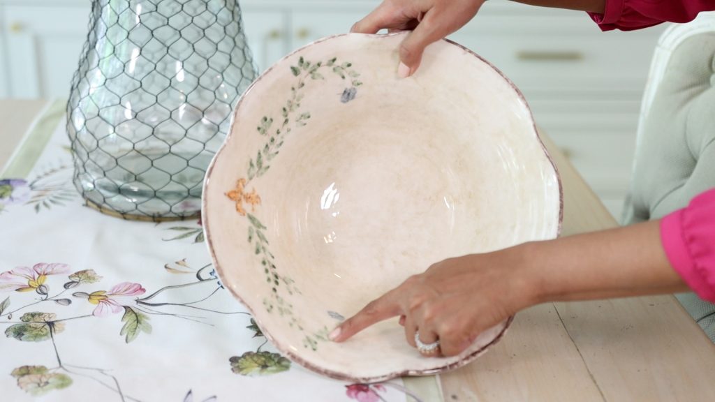 To add to her colorful summer tablescape, Amitha Verma chose to decorate with a pink bowl to match her runner design.