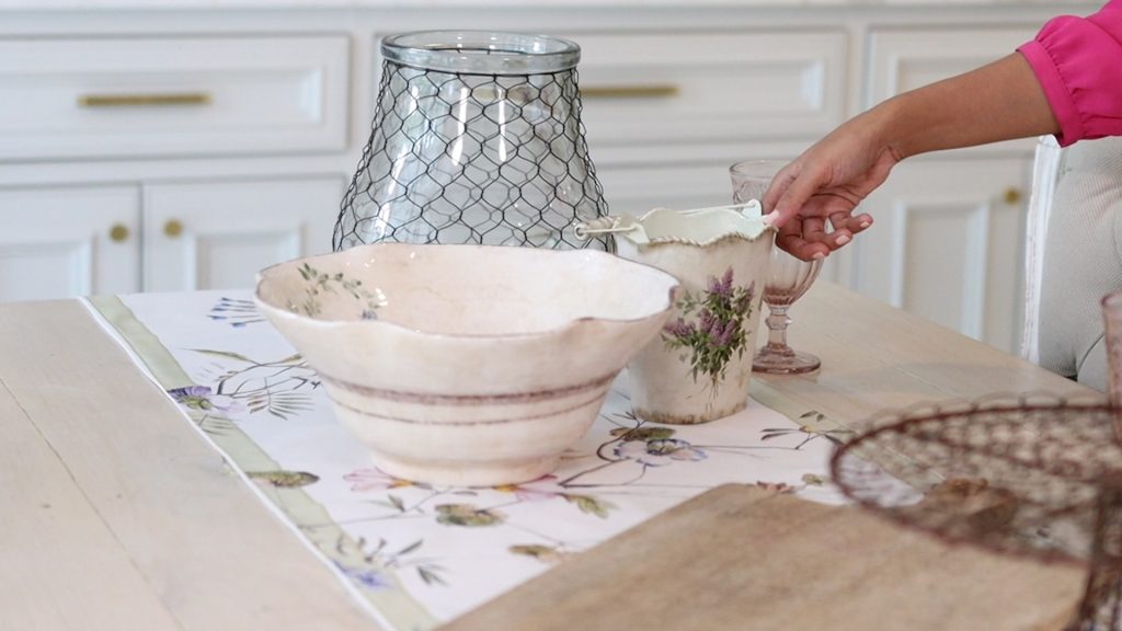 To emphasize the pink on her summer tablescape, Amitha Verma added a single vintage inspired pail from Village Antiques’ spring/summer collection.